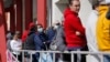 FILE - People wait in line for help with unemployment benefits in Las Vegas, Nevada, March 17, 2020.