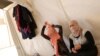 FILE - Yazidi sisters, who escaped from captivity by Islamic State (IS) militants, sit in a tent at Sharya refugee camp on the outskirts of Duhok province, Iraq, July 3, 2015. 