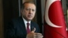 Turkey's President Recep Tayyip Erdogan, delivers a speech during a meeting in Ankara, Oct. 5, 2017. Erdogan has suggested that Turkey, Iran and Iraq are considering blockading Iraq's semi-autonomous region by closing their airspace and borders.