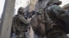 This handout picture released by the Israeli army on Jan. 22, 2024, shows Israeli soldiers operating in the Gaza Strip. (Photo by Israeli Army/AFP)