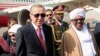 FILE - Sudan’s President Omar al-Bashir welcomes Turkey's President Recep Tayyip Erdogan at Khartoum Airport, Sudan, Dec. 24, 2017. 