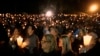 Community members gather for a candlelight vigil for those killed in a shooting at Umpqua Community College in Roseburg, Oregon, Oct. 1, 2015. 