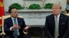 U.S. President Donald Trump listens while meeting with Ireland's Prime Minister (Taoiseach) Leo Varadkar in the Oval Office of the White House in Washington, U.S., March 14, 2018. 
