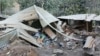 Rumah-rumah yang rusak akibat letusan Gunung Lewotobi Laki-laki di Flores Timur, Senin, 4 November 2024. (Foto: AP Photo)