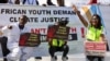 Activistas demandan "justicia climática" en la cumbre COP28 de la ONU en Dubái, el 6 de diciembre de 2023.