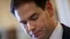 Sen. Marco Rubio, R-Fla., the son of Cuban immigrants, prepares for a news conference where he expressed his disappointment in President Barack Obama's initiative to normalize relations between the U.S. and Cuba, Dec. 17, 2014, on Capitol Hill in Washington.