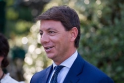 Deputy White House press secretary Hogan Gidley walks back to the West Wing after a television interview at the White House, Tuesday, Aug. 6, 2019, in Washington.
