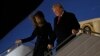 President Donald Trump and first lady Melania Trump alight from Air Force One, after arriving at Orly airport near Paris, Nov. 9, 2018. 