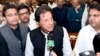 In this photo released by the National Assembly, the leader of Pakistan Tahreek-e-Insaf party Imran Khan,speaks at the National Assembly in Islamabad, Pakistan, Aug. 17, 2018. Pakistani lawmakers Friday elected former cricket star and longtime politician Khan as the country's next prime minister. 