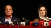 Ousted Pakistani prime minister Nawaz Sharif appears with his daughter Maryam at a news conference at a hotel in London, Britain, July 11, 2018. 