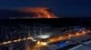 In this photo taken from the roof of Ukraine's Chernobyl nuclear power plant late Friday April 10, 2020, a forest fire is seen burning near the plant inside the exclusion zone. Ukrainian firefighters are labouring to put out two forest blazes in…