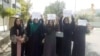 A group of women hold a street protest calling on the Taliban to protect their rights, in Kabul, Afghanistan August 17, 2021 in this still image taken from video dated August 17, 2021.