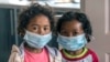 Children wear face masks at a school in Antananarivo, Madagascar, Oct. 3, 2017.