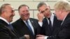 From left, Turkish Foreign Minister Mevlut Cavusoglu, U.S. Secretary of State Mike Pompeo, NATO Secretary General Jens Stoltenberg and British Foreign Secretary Boris Johnson speak prior to a meeting of NATO foreign ministers at NATO headquarters in Brussels, April 27, 2018.