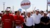 FILE - Turkey's main opposition Republican People's Party (CHP) leader Kemal Kilicdaroglu (C) and Secretay-General of the Socialist International Luis Ayala (2nd L) walk flanked by supporters during the 14th day of a protest dubbed "justice march" against the detention of CHP's lawmaker Enis Berberoglu, in Duzce, June 28, 2017. The placard reads "Justice."