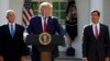President Donald Trump, with Vice President Mike Pence and Defense Secretary Mark Esper, speaks at a U.S. Space Command ceremony, in Washington, Aug. 29, 2019. He began by saying he'd cancel a trip abroad to monitor preparations for Hurricane Dorian.