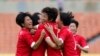 지난해 7월 한국에서 열린 동아시아 여자축구대회에 출전한 북한 선수들이 중국과의 경기에서 득점한 후 환호하고 있다. (자료사진)