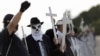 Manifestantes protestan contra el manejo del presidente brasileño Bolsonaro del brote de COVID-19, en Brasilia, el 26 de marzo de 2021.