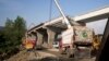 FILE - Construction work is in progress at a new international trade route which part of a sprawling Chinese initiative to build a "new Silk Road" of ports, railways, and roads to expand trade in a vast arc of countries across Asia, Africa and Europe, near Havalian Pakistan, May 11, 2017.