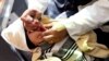 A child receives a polio vaccination on the outskirts of the Yemeni capital Sana'a, on Dec. 11, 2017.