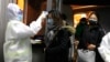 Las autoridades chinas mantienen un estricto control de todas las personas que salen de Wuhan, donde comenzó la epidemia de coronavirus y donde aún hay 14 colombianos que no han podido abandonar la ciudad.