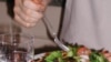 Robert Keeling enjoys a paleo stir-fry with shrimp, broccoli, mushrooms and yams.