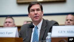 FILE - Secretary of the Army Mark Esper speaks during a House Armed Services Committee budget hearing on Capitol Hill in Washington, April 2, 2019.