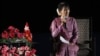 Nobel Peace laureate and Burma opposition leader Aung San Suu Kyi speaks at the Los Angeles Convention Center in Los Angeles, October 2, 2012.