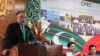 FILE - Ahsan Iqbal, then Pakistan's minister for planning and development, speaks during the launch ceremony of the China-Pakistan Economic Corridor (CPEC) long-term cooperation plan, in Islamabad, Pakistan, Dec. 18, 2017. There is now talk of expanding the project into Afghanistan.
