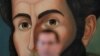 El canciller de Venezuela, Jorge Arreaza, frente a un retrato de Simón Bolivar, El Libertador, durante una rueda de prensa en Caracas, el 6 de agosto de 2019.