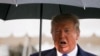 U.S. President Donald Trump speaks to reporters as he and first lady Melania Trump depart for travel to a NATO summit in London, from the White House in Washington, Dec. 2, 2019. 